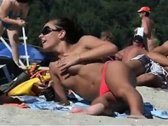 Topless Beauties Check Out At The Beach