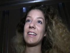 Curly babe swallows cum in public